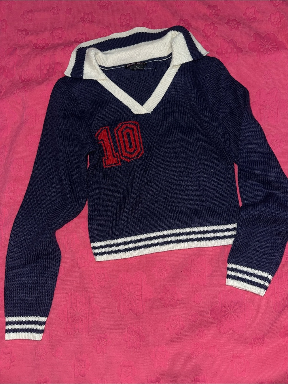 Navy V-Neck Sweater with White Trim and Red '10' Patch